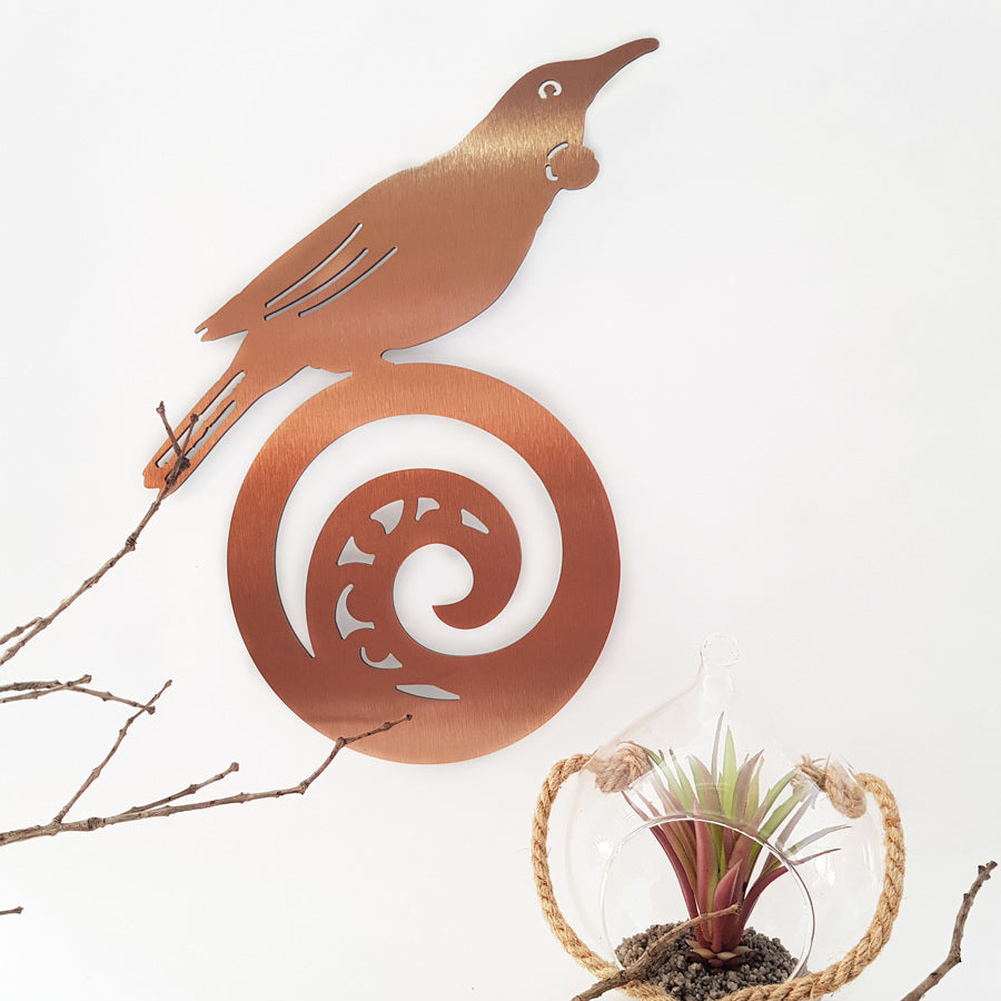 Kiwiana wall art featuring a Tui perched on a koru, crafted from durable 4mm ACM, perfect for indoor or outdoor display.