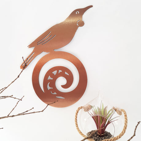 Kiwiana wall art featuring a Tui perched on a koru, crafted from durable 4mm ACM, perfect for indoor or outdoor display.