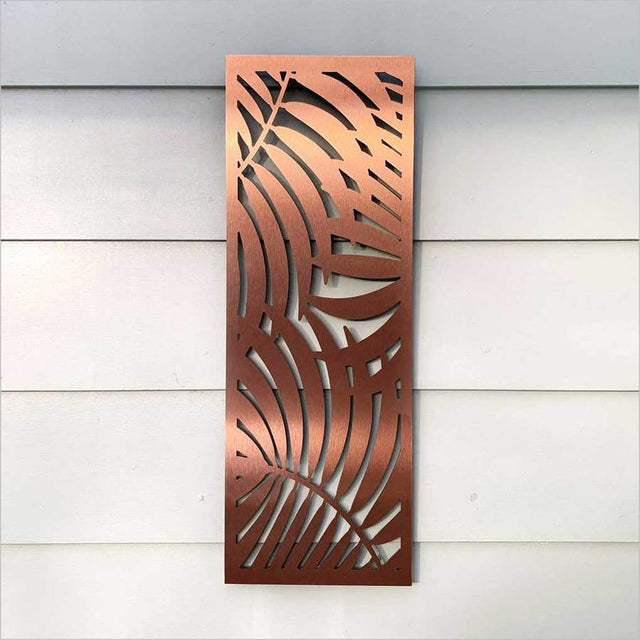 Large brushed copper wall art featuring three palm silhouettes, perfect for enhancing indoor or outdoor spaces.