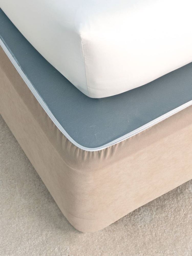 Linen double bed wrap with adjustable edges for a stylish and polished bedroom look, made from durable faux suede.