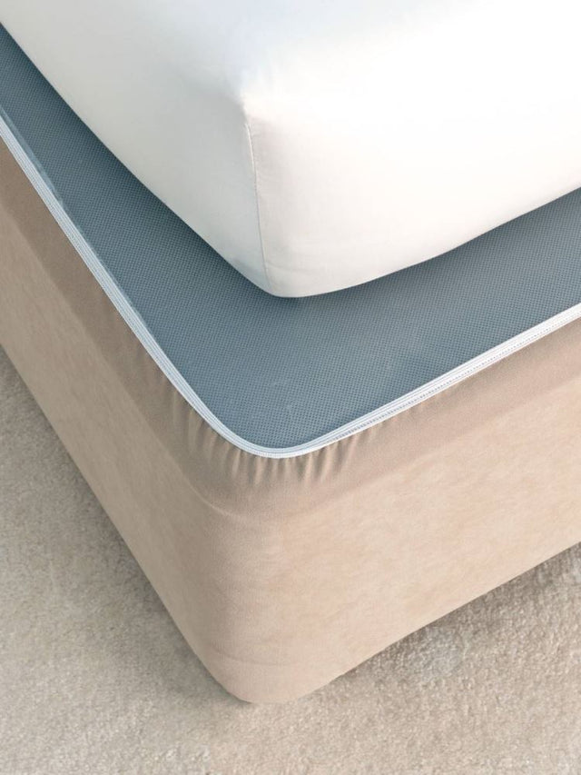 Linen double bed wrap with adjustable edges for a stylish and polished bedroom look, made from durable faux suede.