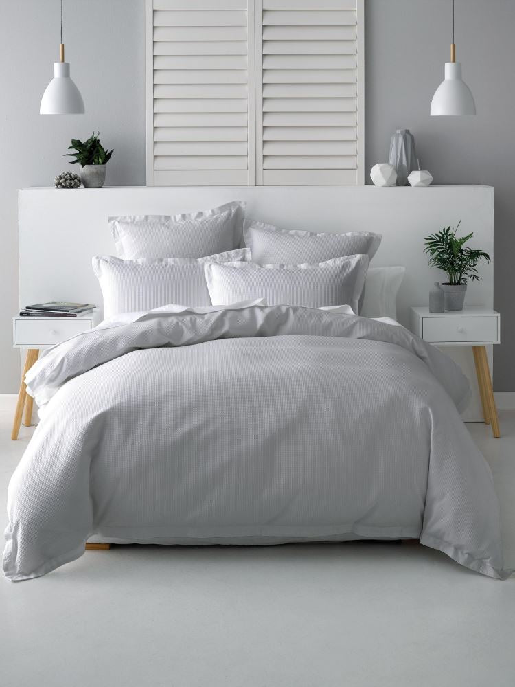 Super King Bed Duvet Set in Nova Silver featuring textured waffle design, soft percale reverse, and tailored flange for elegant comfort.