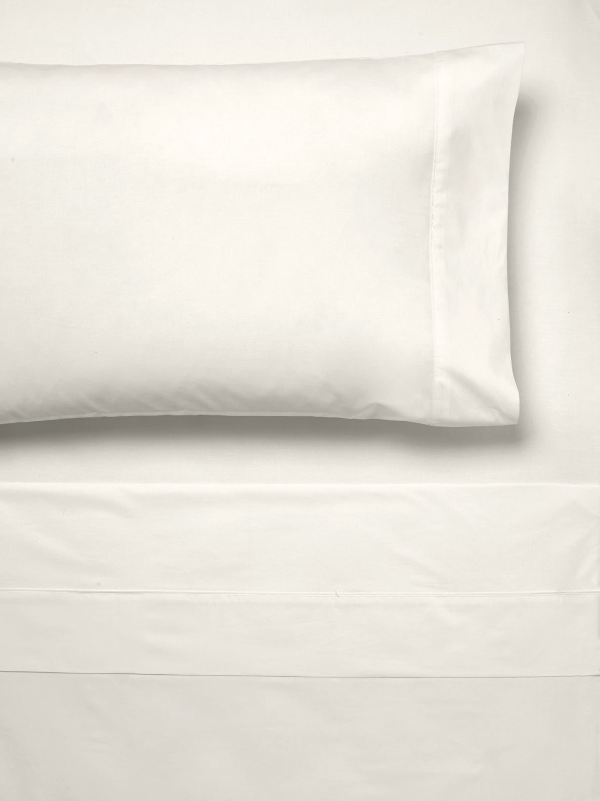 Luxurious King Sheet Set in cream color, made from 300T cotton percale for a soft, breathable, and modern bedding experience.