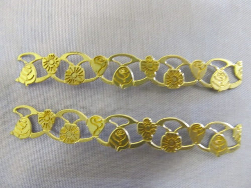 Wooden Ships & Fittings ornament showcasing intricate craftsmanship, perfect for nautical decor enthusiasts.