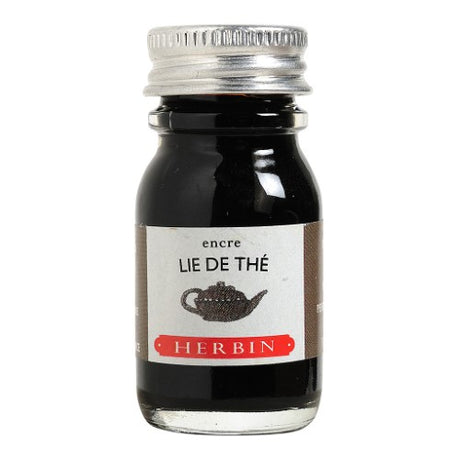 Herbin Writing Ink 10ml Lie de The in a glass bottle, rich Tea Brown color, perfect for fountain pens and artistic projects.