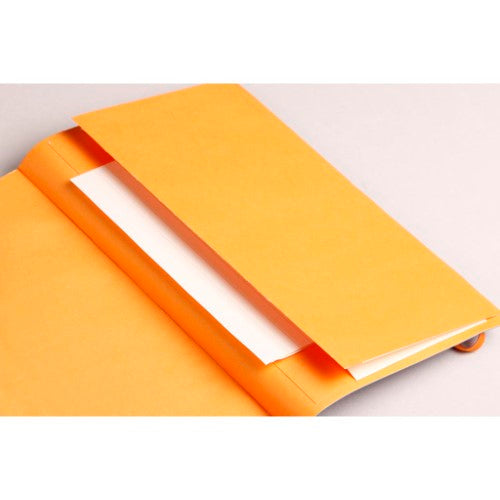 Vibrant daffodil-colored Rhodiarama softcover notebook with 160 dotted pages, elastic closure, and premium bleed-proof paper.