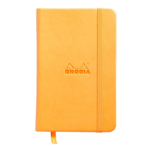 Vibrant orange Rhodia Webnotebook pocket-size, smooth leatherette cover, elastic closure, 192 blank ivory pages for creative use.