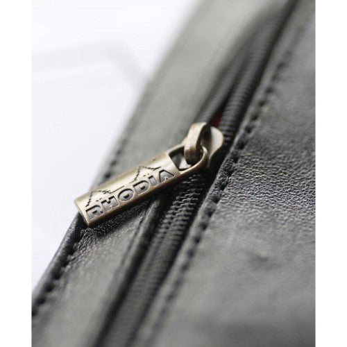 Elegant black leather pencil case with metallic puller, embossed logo, and ample space for pens and pencils.