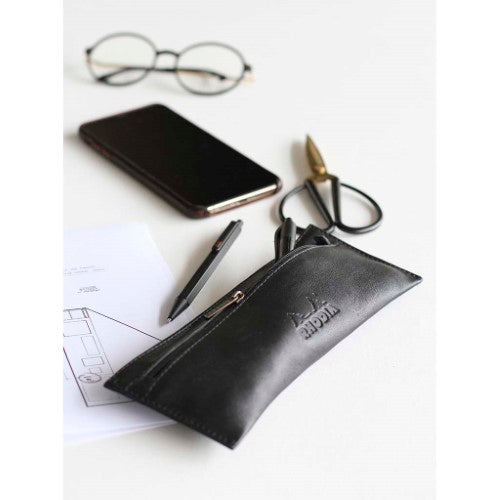 Elegant black leather pencil case with metallic puller, embossed logo, ideal for organizing writing supplies.