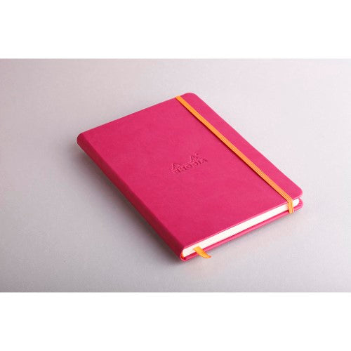Rhodiarama A5 notebook in raspberry with embossed logo, elastic closure, and 192 lined pages of ivory paper.