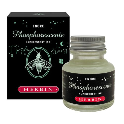 30ml Herbin Luminescent Ink in a glass bottle, perfect for creating vibrant artworks on dark papers, glowing in low light.