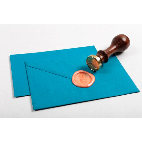 Elegant dark brown wooden handle for wax seal discs, providing superior grip and control for exquisite sealing.