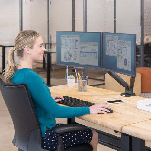 Fellowes Platinum Dual Monitor Arm elevates dual screens for ergonomic comfort and optimized workspace with gas spring technology.