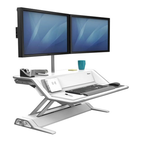 Fellowes Lotus DX Sit Stand Workstation in White with ergonomic design, wireless charging, USB ports, and Microban protection.
