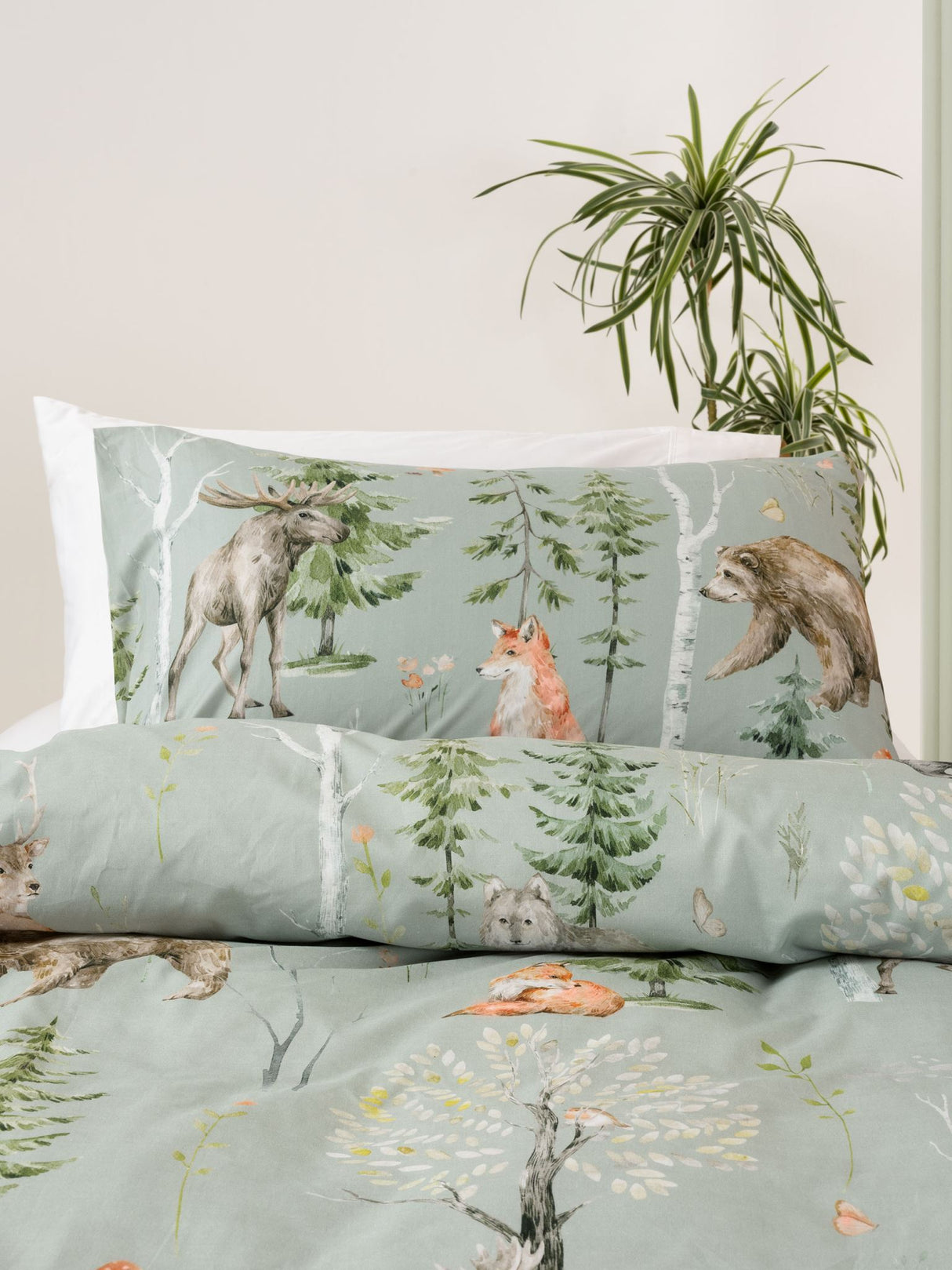 Single duvet cover set featuring hand-painted forest animals on a sage green background, made from 100% cotton.