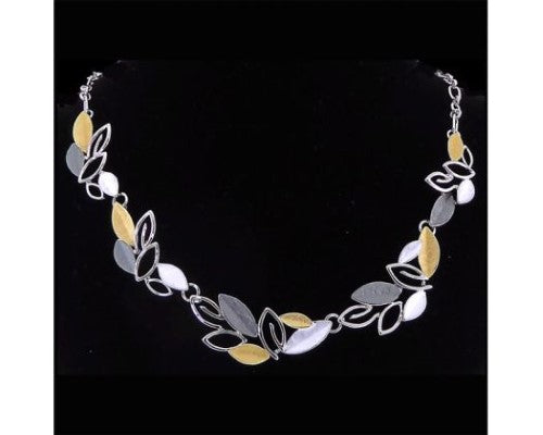 Rhodium plated necklace with silver leaves design, perfect for elevating casual and formal styles.