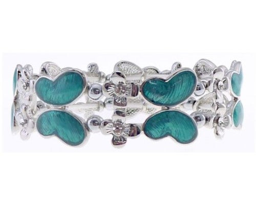 Teal butterflies bracelet with silver and diamante flowers, perfect for adding color and elegance to any outfit.