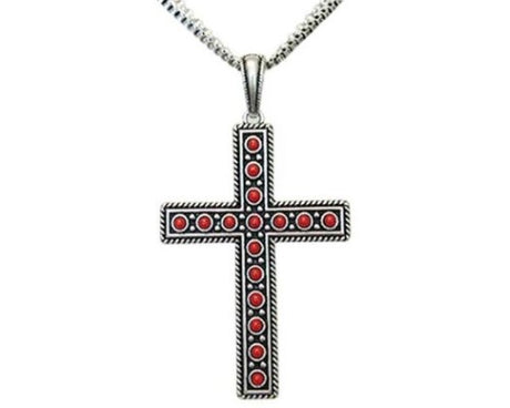 Antique silver cross necklace with red detailing, featuring unique pendant and intertwined chains for versatile styling.