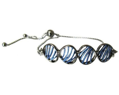 Adjustable gunmetal bracelet featuring four blue shells, perfect for ocean-inspired fashion and unique style.