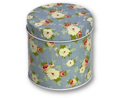 Round tin with vibrant blue floral pattern, perfect for storing sweets, biscuits, and small trinkets, 8.5 cm wide.