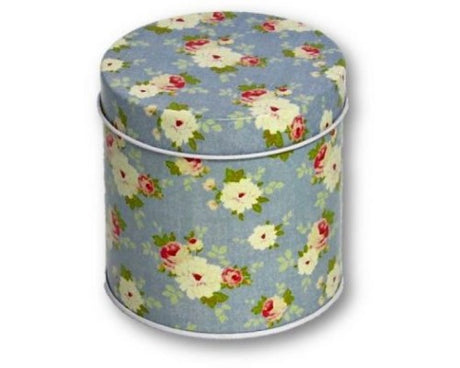 Round tin with vibrant blue floral pattern, perfect for storing sweets, biscuits, and small trinkets, 8.5 cm wide.