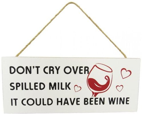 Whimsical MDF wall art featuring a spilled wine glass, perfect for kitchen decor, with rustic twine hanger.