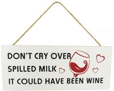 Whimsical MDF wall art featuring a spilled wine glass, perfect for kitchen decor, with rustic twine hanger.