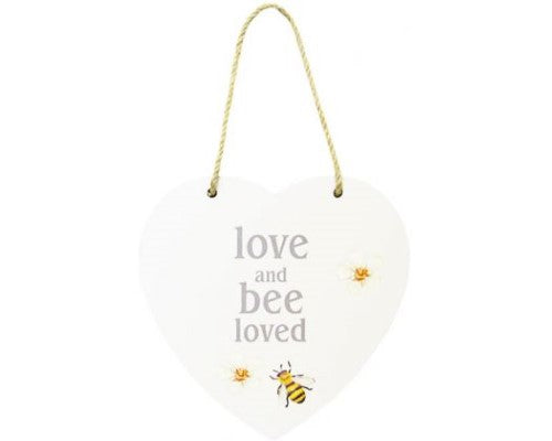 Heart-shaped MDF wall art with twine hanger, inscribed 'Love, and Bee Loved', perfect for nature-themed decor.