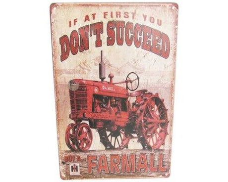 Vintage tin sign featuring an old tractor, perfect for rustic home decor and adding charm to any space.