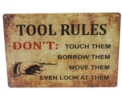 Vintage-style tin sign featuring quirky tool rules, perfect for garages and man caves, measuring 30cm x 20cm.