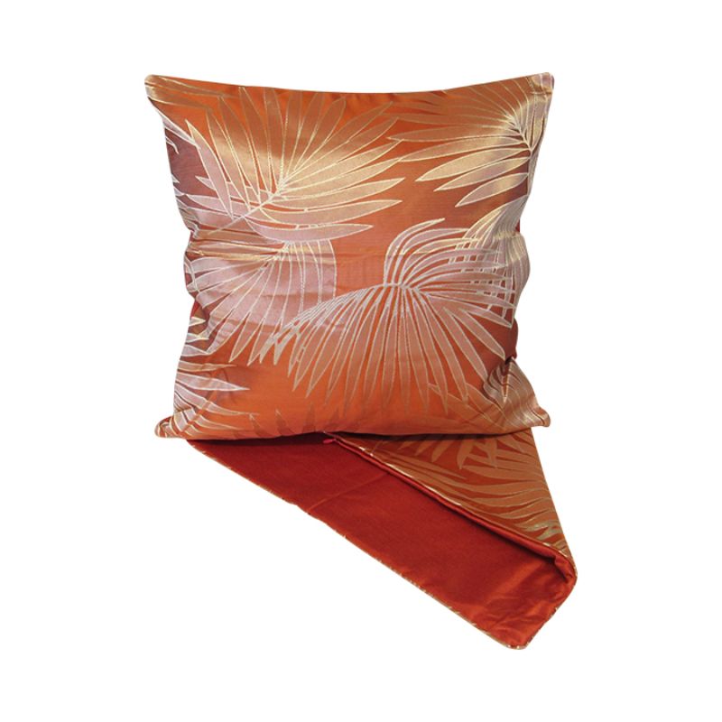 Silver palm design on burnt orange cushion cover, 44cm, adds tropical elegance to any living space.