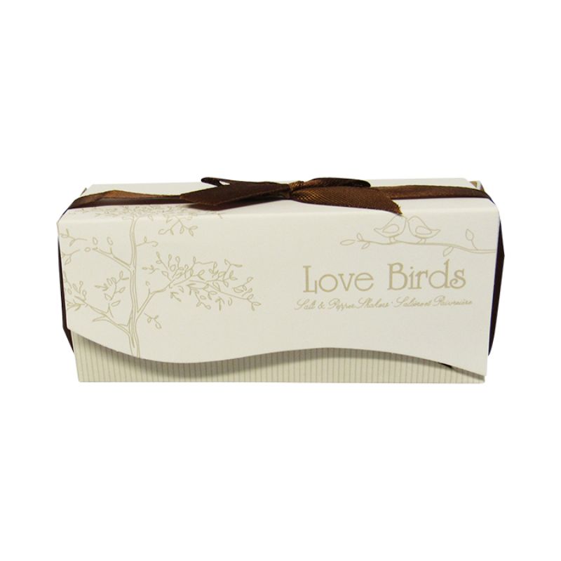 Charming white love bird salt and pepper shakers, perfect for romantic table settings, elegantly packaged for gifting.