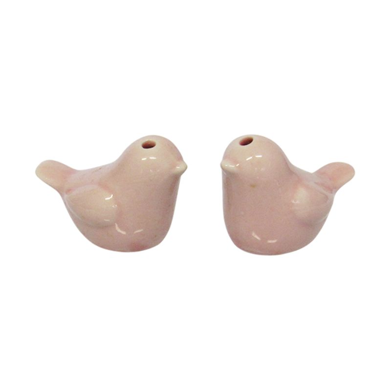 Charming pink love bird salt and pepper shakers, perfect for whimsical dining decor, packaged in a gift box with a ribbon.