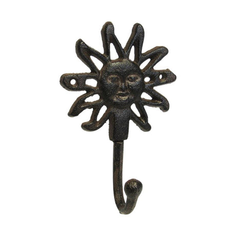 Cast iron sun-shaped hook measuring 11 x 17 cm, perfect for hanging jackets or decorative items.