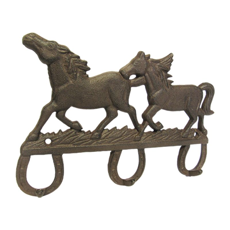 Rustic cast iron triple hook featuring two majestic horses, perfect for organizing coats and bags while enhancing decor.