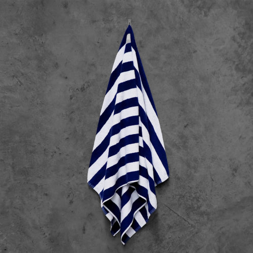 Navy and white striped pool towel, soft cotton, 75cm x 150cm, durable, fade-resistant, perfect for beach or poolside lounging.