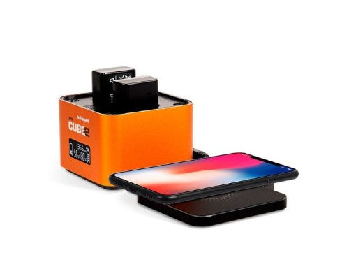 Hahnel PowerCube wireless charger for fast charging of phones and camera batteries in a sleek desktop design.