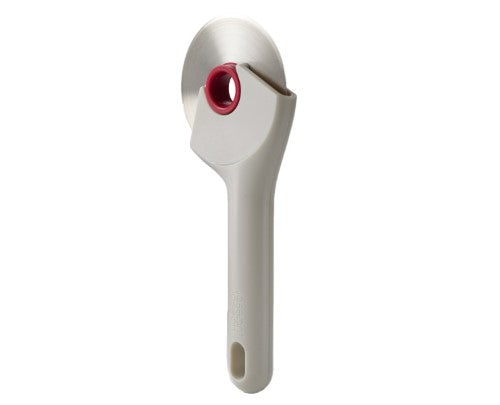 Ringo Pizza Wheel by Joseph Joseph with sharp stainless-steel blade and ergonomic handle for easy slicing of pizzas and more.