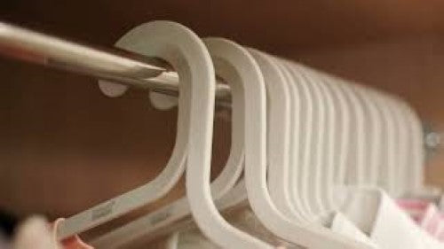 Orderly 5-Piece Anti-Tangle Hanger Set features oversized hooks, non-slip grips, and eco-friendly design for organized wardrobes.