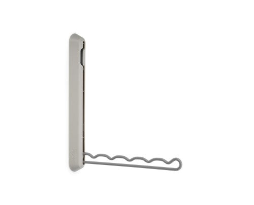 Orderly Retractable Hanging Rail by Joseph Joseph, wall-mountable for drying or ironing clothes, folds neatly away when not in use.