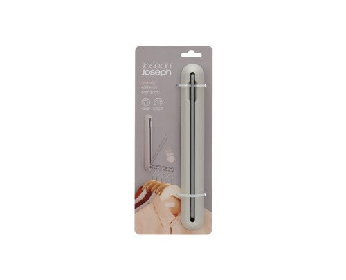 Orderly Retractable Hanging Rail by Joseph Joseph, a space-saving solution for drying or ironing clothes, mounts on walls or doors.