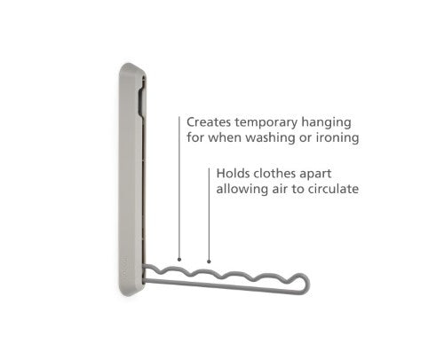 Orderly Retractable Hanging Rail by Joseph Joseph, a space-saving wall-mount rail for drying and ironing clothes.