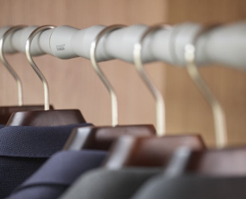 Orderly Suit Rail Spacers by Joseph Joseph, designed to keep clothes neat and organized with a unique zigzag spacing system.