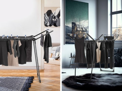Leifheit Pegasus 150 Slim Black dryer with foldable wings, 15m drying line, stable legs, and rust-proof design.