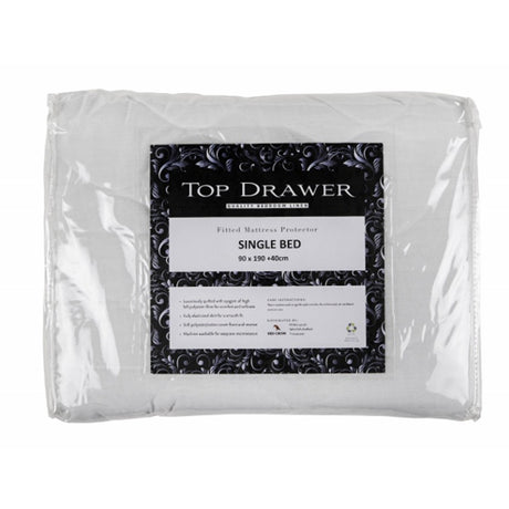 King mattress protector with quilted polyester front, offering comfort, protection, and a snug fit for optimal sleep.