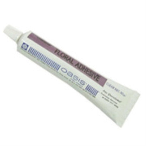 Clear floral adhesive tube by Oasis, perfect for bonding flowers and decorations without residue.