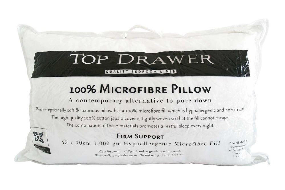 Firm microfibre pillow with 100% cotton cover, hypoallergenic, 45x70 cm for optimal support and comfort.