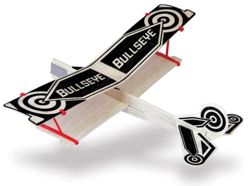 Unassembled Bullseye Biplane balsa model kit by Guillows, ideal for creative DIY and learning about flight principles.