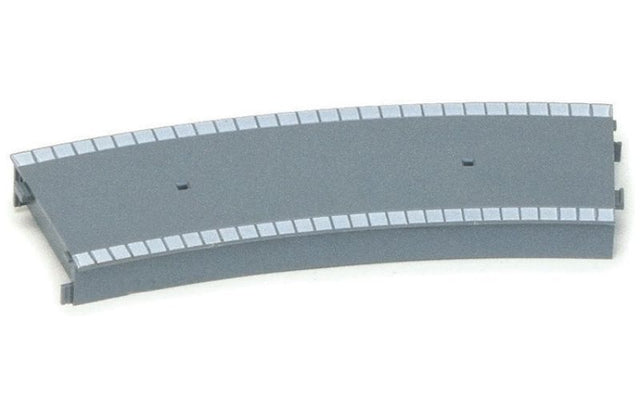 Plastic curved platform for 1/76 scale model trains, enhancing realism in railway layouts.