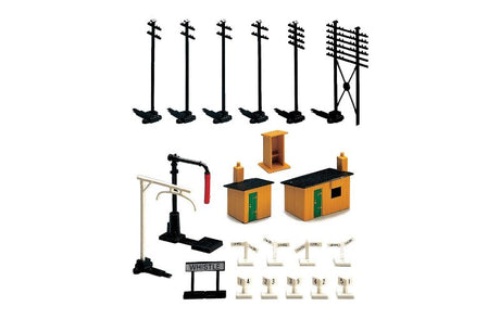 Hornby Trackside Access Pack featuring huts, telegraph poles, water crane, and signs for realistic model railway setups.